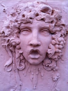 stone woman's face KC Plaza